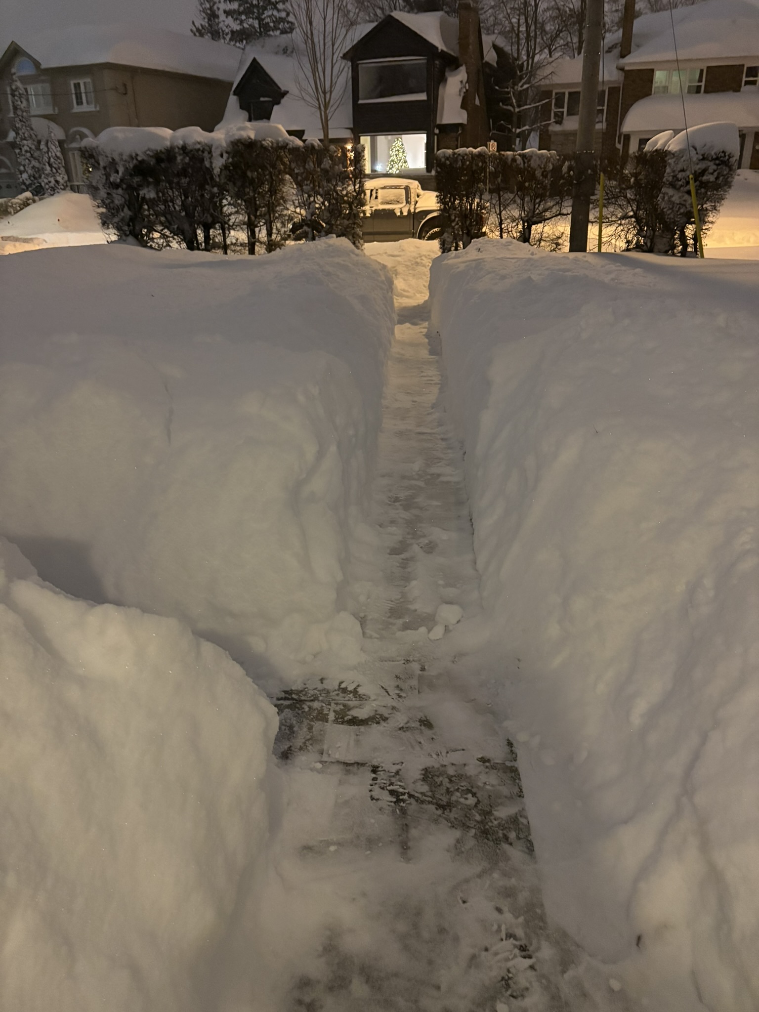 Snow clearing beside a home