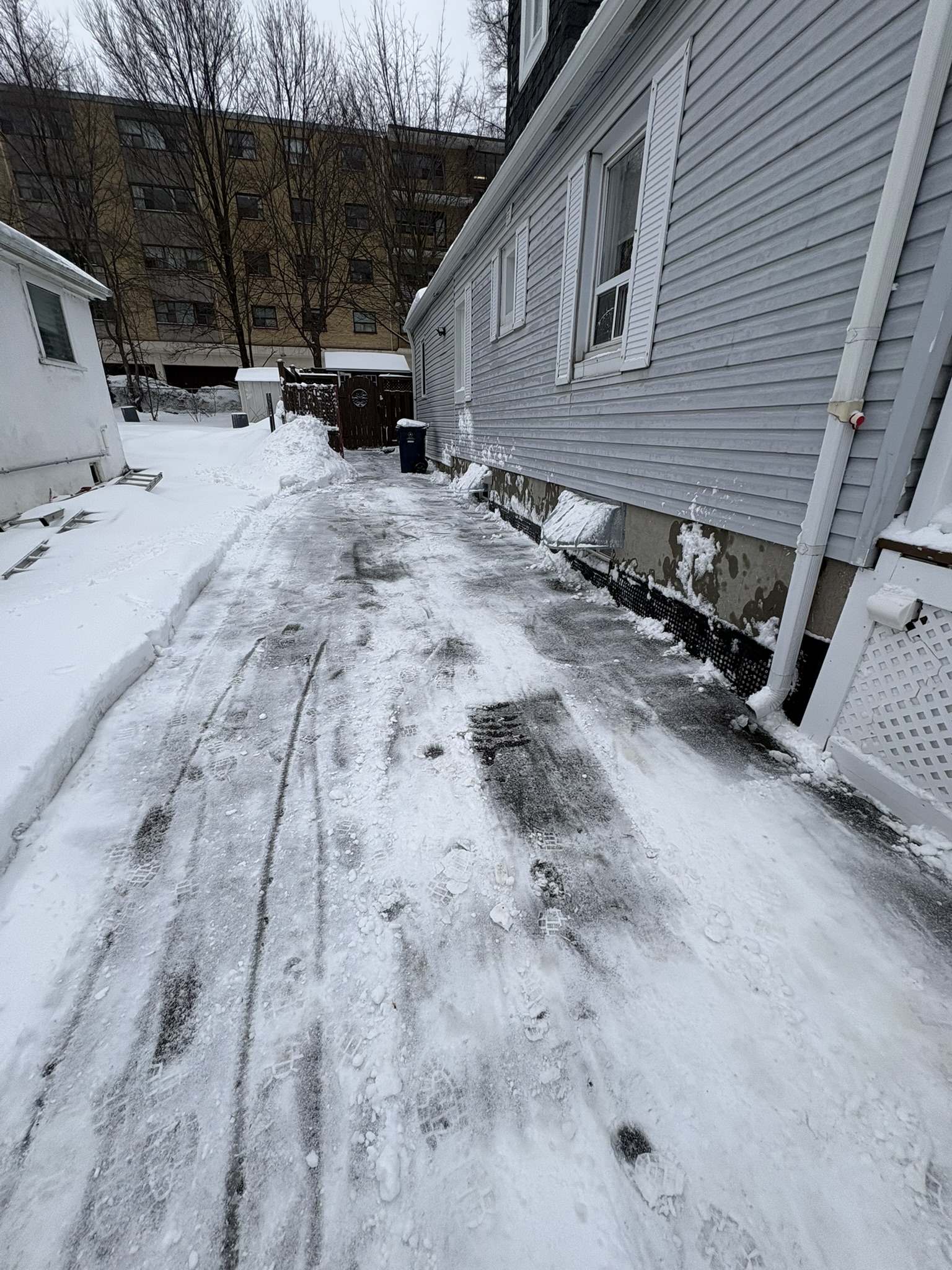 Cleared side path beside a house