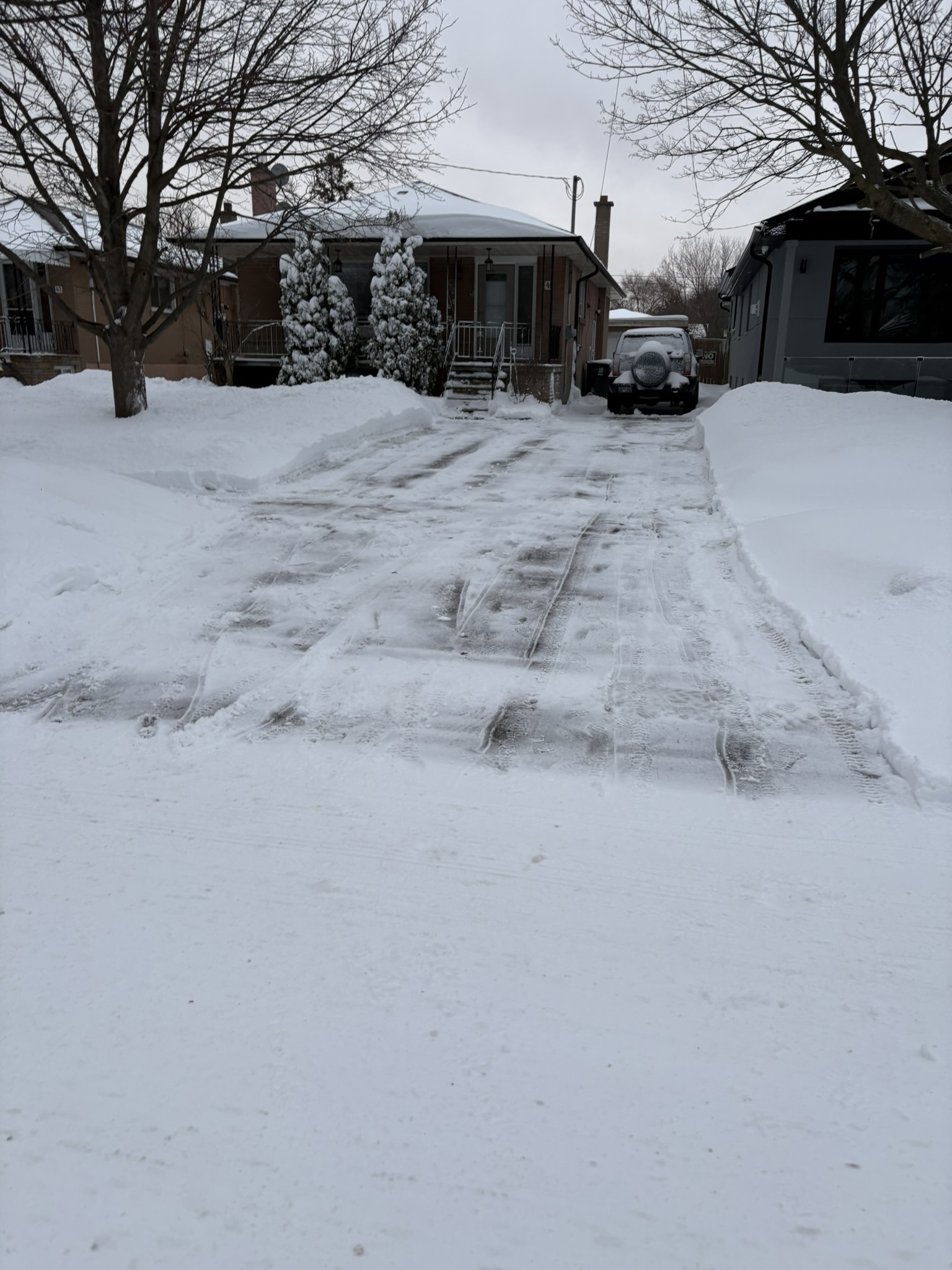 Snowbanks along a cleared path